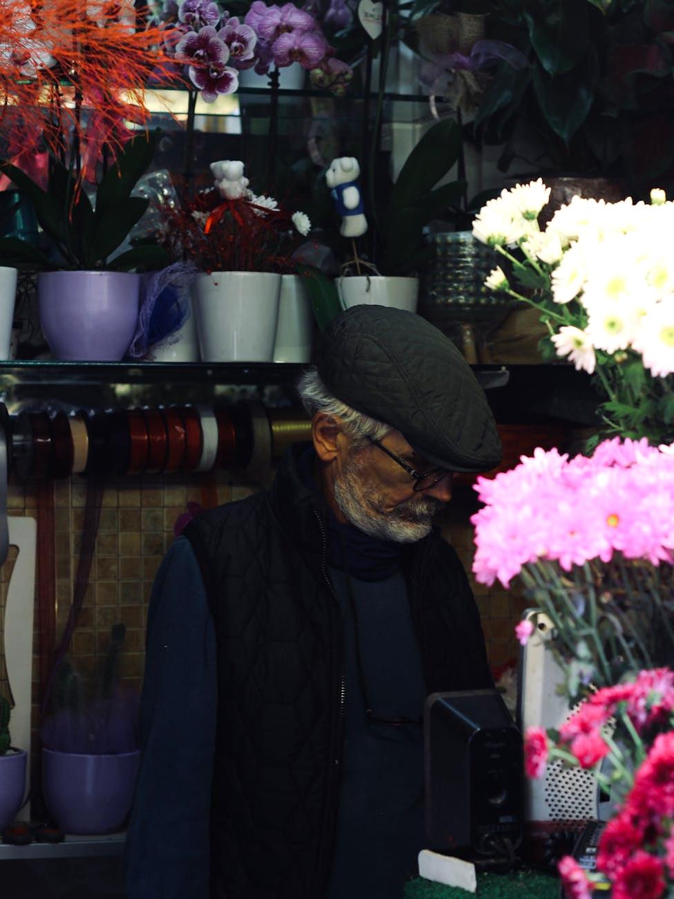 Marcus the florist with professional arrangement